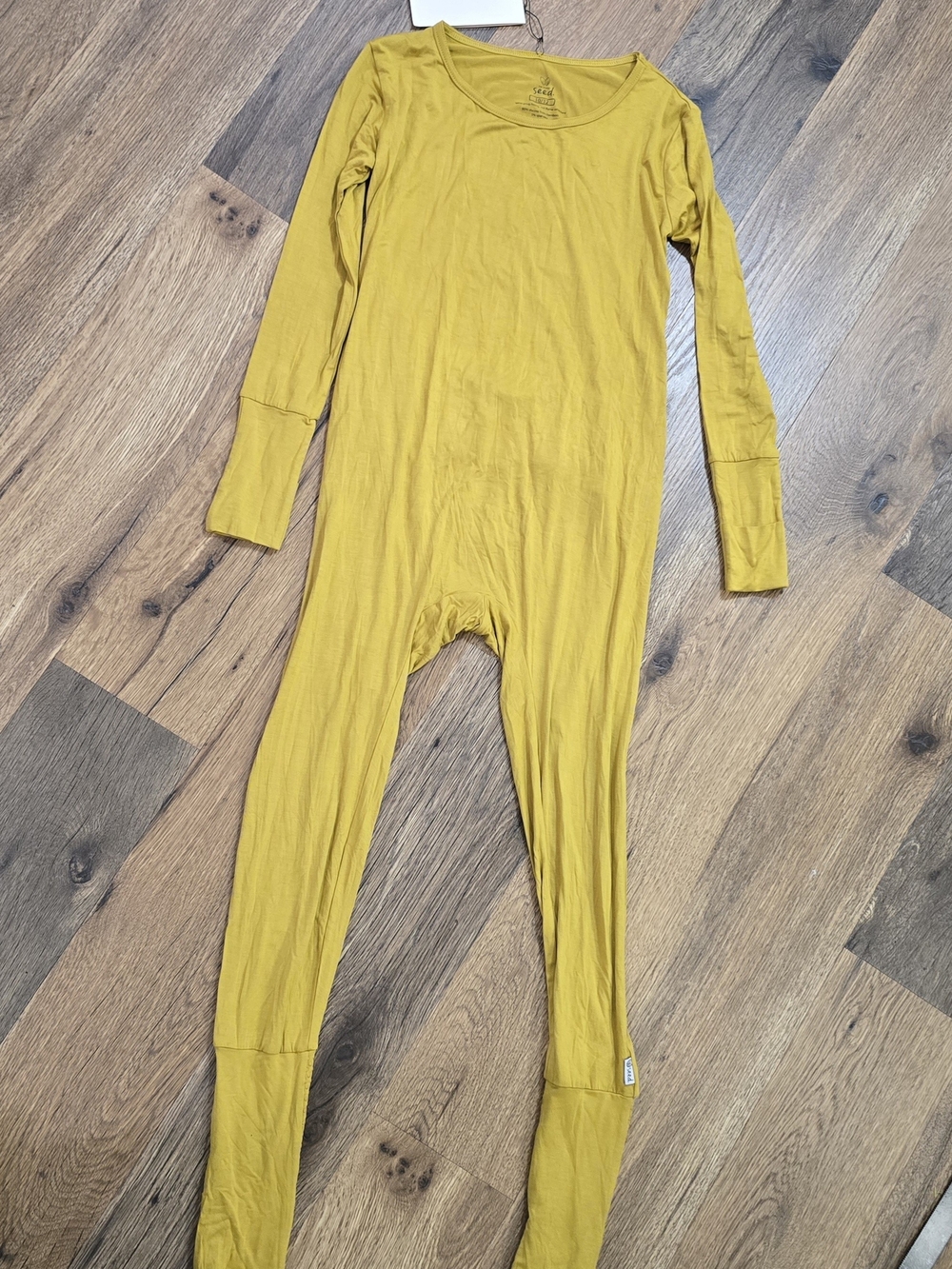 The Simple Seed Child Mustard Long-Sleeve One-Piece Romper